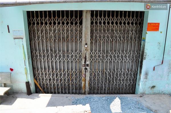 Nâng đường chống ngập ở Sài Gòn, hàng loạt ngôi nhà biến thành... hầm - 1