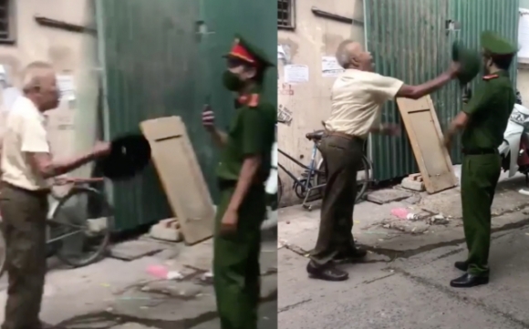 1 Ha Noi Phat 2 Trieu Dong Nguoi Dan Ong Dung Mu Coi Dap Vao Dau Chien Si Cong An Vi Bi Nhac Nho Deo Khau Trang