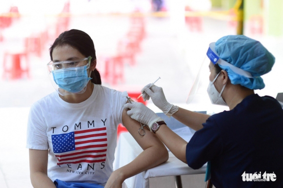 1 Tphcm Toc Do Tiem Vac Xin Tai Cac Quan Huyen Va Tp Thu Duc Ra Sao