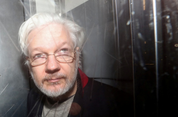 1 Toa An Anh Chap Thuan Viec Dan Do Nha Sang Lap Wikileaks Sang My