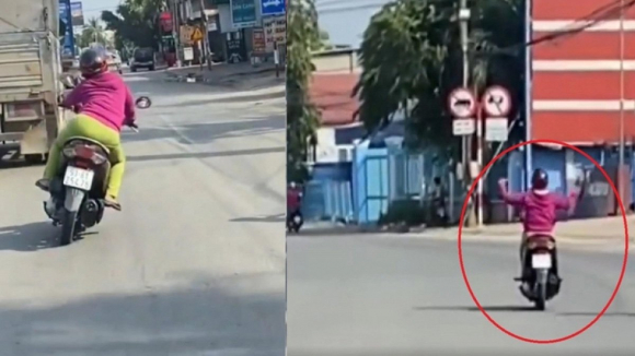 1 Nu Tai Xe Lang Lach Danh Vong Buong Hai Tay Giua Lan Xe O To O Binh Duong